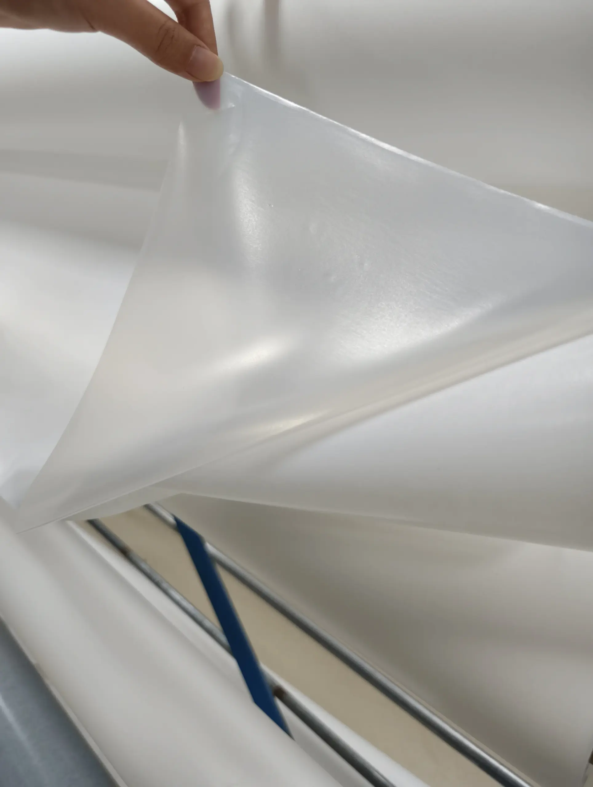 Hot melt adhesive film for leather