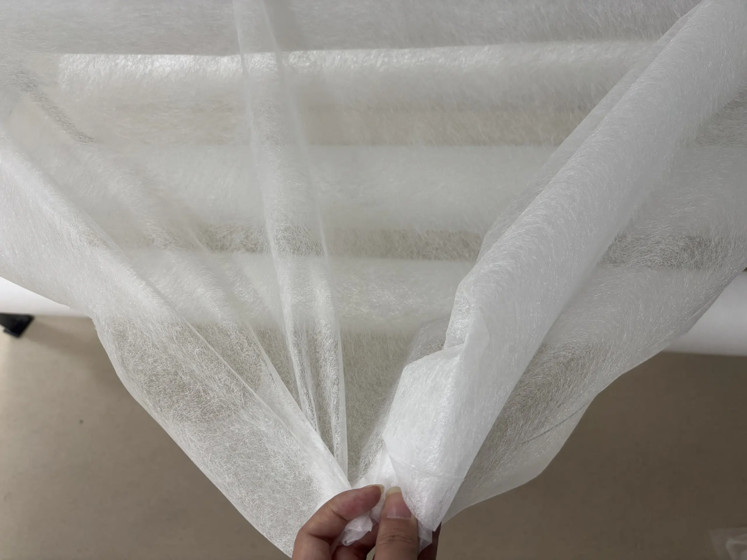 Foam and sponge hot melt adhesive lamination process