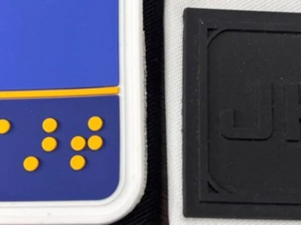 Comparison of clean bonding edges and adhesive overflow on PVC patches.
