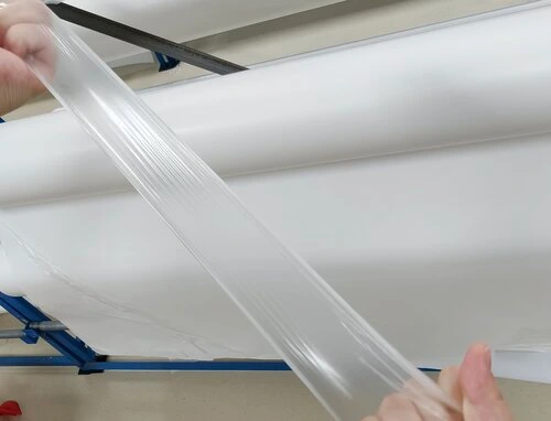 Elastic Hot Melt Adhesive Film for Stretch Fabrics: Complete Selection Guide for Apparel Manufacturers