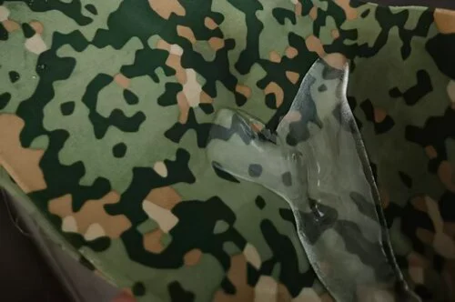 Waterproof and wash resistance performance testing on TPU adhesive bonded camouflage textile