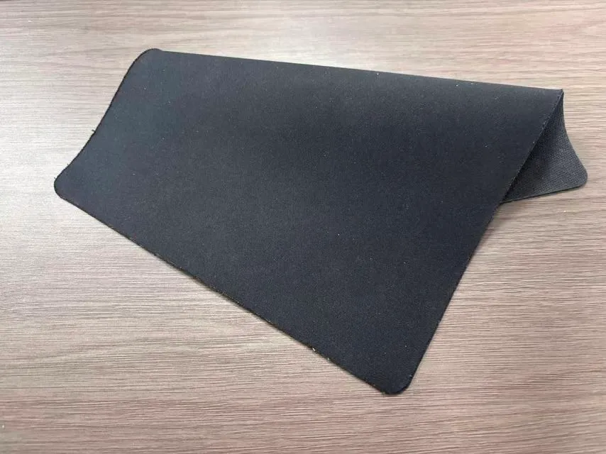 Finished mouse pad laminated from PP fabric and sponge with TPU hot melt adhesive film